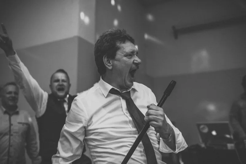 From Boardroom to Ballad: How Karaoke Became Corporate America's Favorite Team-Building Secret